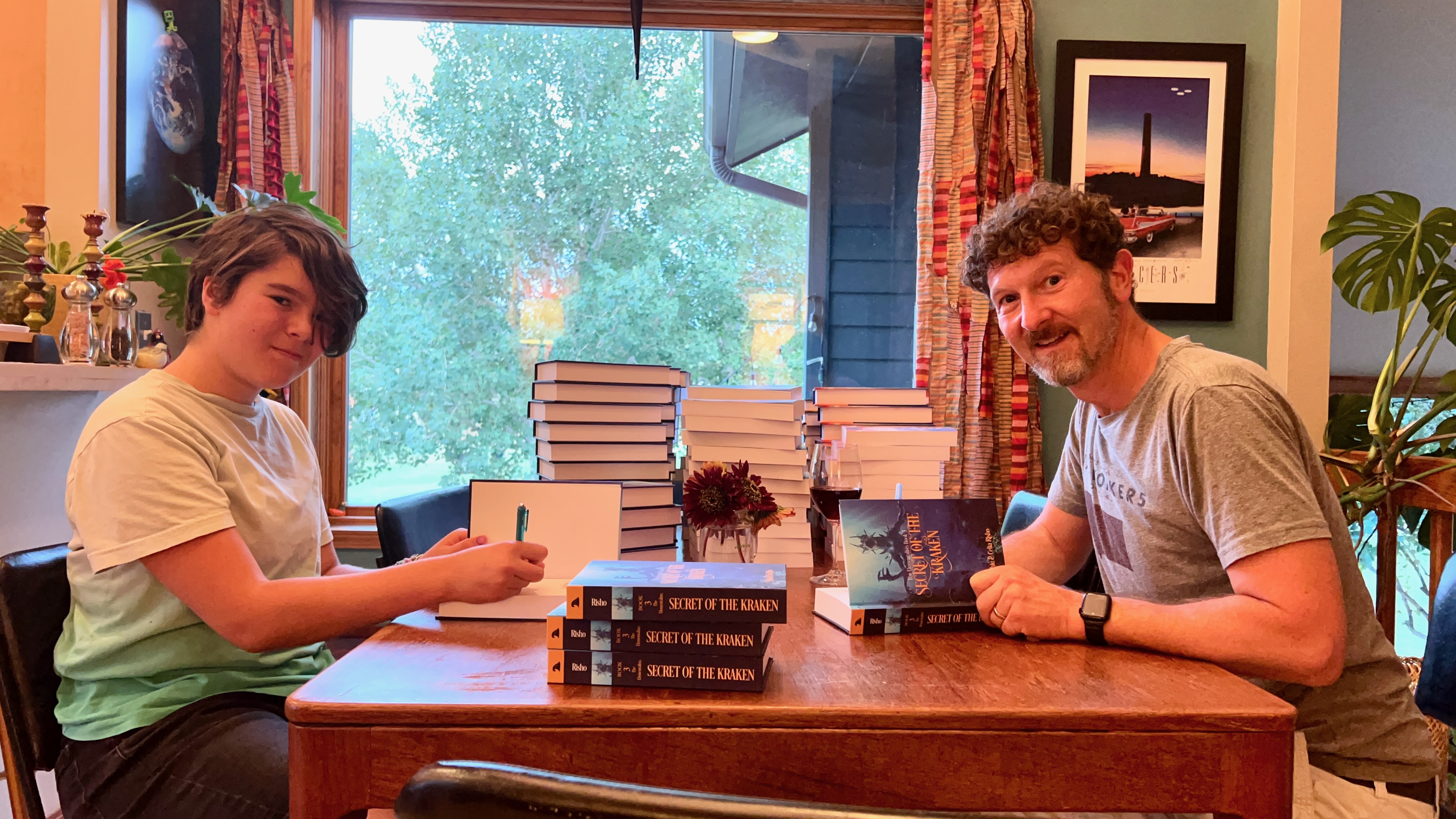 Ephie and Blue Risho signing books at a launch event